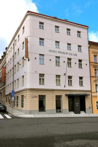 a white building with the words hotel throughput soale at Hotel Prokop Square in Prague