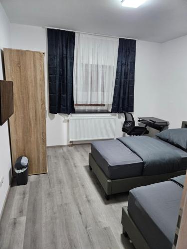 Postel nebo postele na pokoji v ubytování Ferienwohnung 2 Seldüz