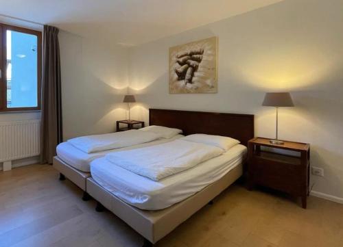 Postel nebo postele na pokoji v ubytování Resort Walensee 45