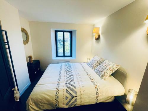 Giường trong phòng chung tại Villa du Parc le Frêne