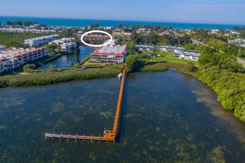 an aerial view of a river with a bridge in the water at Sunbow Bay 108 condo in Holmes Beach