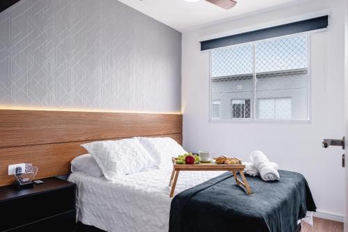 Un pat sau paturi într-o cameră la Apartamento Autódromo de Interlagos sp