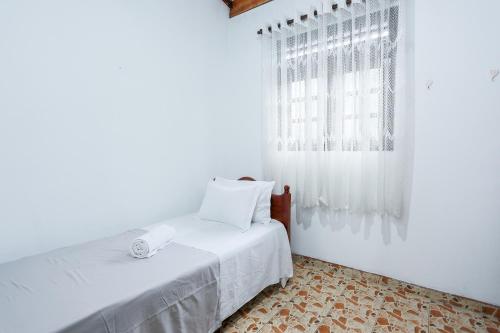 Postel nebo postele na pokoji v ubytování Eco Kings Villa