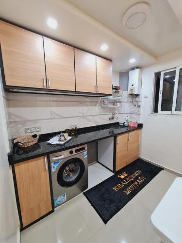 Kuchyň nebo kuchyňský kout v ubytování Appartement Sala Al Jadida