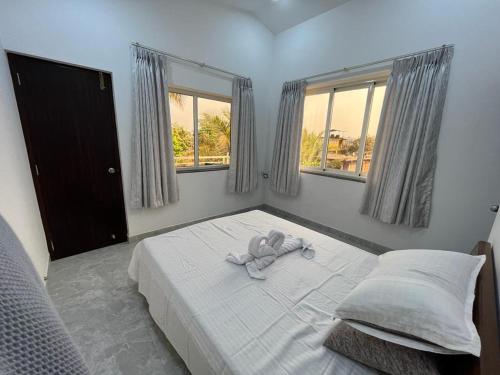 Una cama o camas en una habitación de Le Ménage
