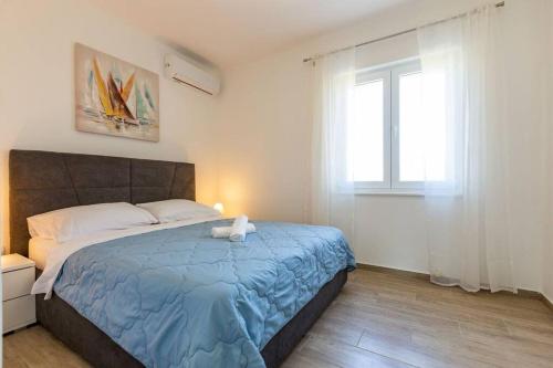 Posteľ alebo postele v izbe v ubytovaní Silvija Holiday Home