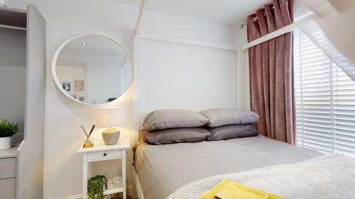 Krevet ili kreveti u jedinici u okviru objekta Modern Cardiff City Apartment