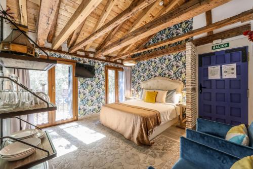 En eller flere senge i et værelse på Apartamento Plaza de España 7