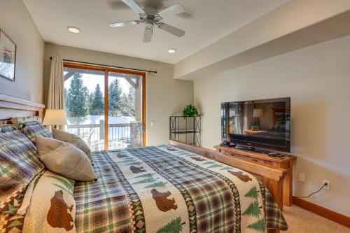 a bedroom with a bed and a flat screen tv at Condo with King Bed 3 Mi to Breckenridge Gondola! in Breckenridge