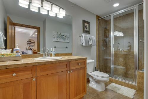a bathroom with a toilet sink and a shower at Condo with King Bed 3 Mi to Breckenridge Gondola! in Breckenridge