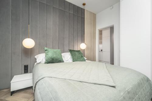 Postel nebo postele na pokoji v ubytování Comfy Apartments 4-5th Floor Hanza Tower - Sauna & Pool