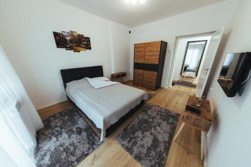 Krevet ili kreveti u jedinici u objektu Sunny Apartment