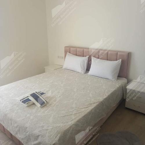 Säng eller sängar i ett rum på Duplex 3 bedroom ocean view Taghazout Bay Tamourit