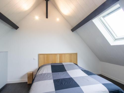 a bedroom with a bed in a attic at Maison moderne avec WiFi, animaux admis, parking et climatisation en Périgord Vert - FR-1-616-337 in Preyssac-dʼExcideuil