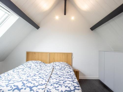 a bedroom with a bed in a attic at Maison moderne avec WiFi, animaux admis, parking et climatisation en Périgord Vert - FR-1-616-337 in Preyssac-dʼExcideuil