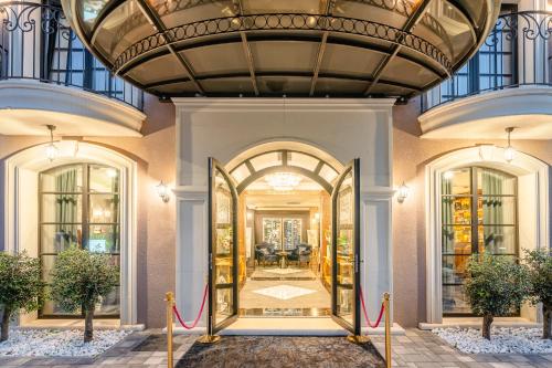 a view of the front door of a building at Boutique Hotel Bora & Villas Garamm in Pakoštane