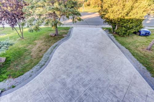 an overhead view of a concrete walkway at Stunning 7 Br RougeView Home with 2 Kitchens, 5 Bathrooms, Amazing Backyard & 8-Car Parking in Toronto