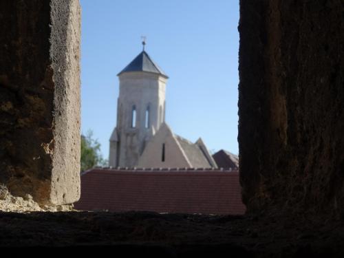 a view from a window of a building with a tower at Gästehaus auf der Kunstmeile in Krems an der Donau