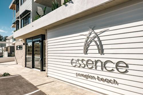 a garage door with the entrance to a apartment beach at Essence Peregian Beach Resort - Lily 4 Bedroom Luxury Home with Private Pool in Peregian Beach