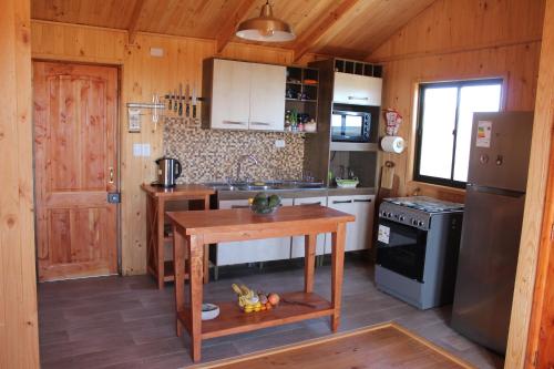 Una cocina o zona de cocina en Acun Lihuen