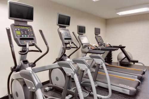 a row of cardio machines in a gym at Drury Inn & Suites Birmingham Grandview in Birmingham