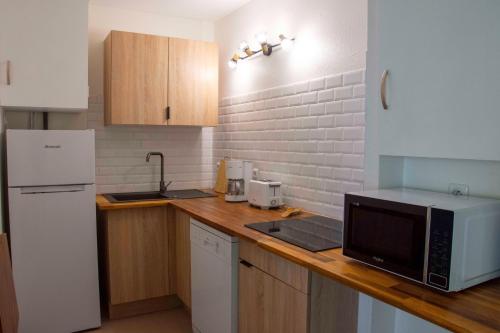 Cucina o angolo cottura di Appartement tout confort ! Au pied de la plage !