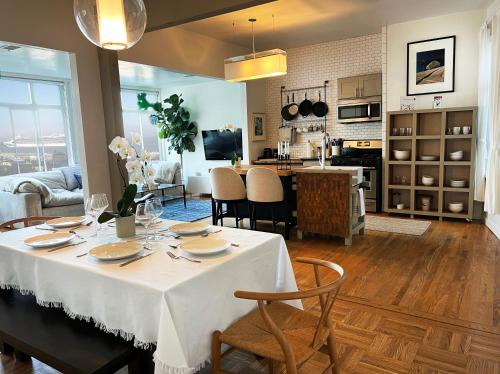 a kitchen and living room with a table and chairs at Great bay views in Russian Hill district in San Francisco