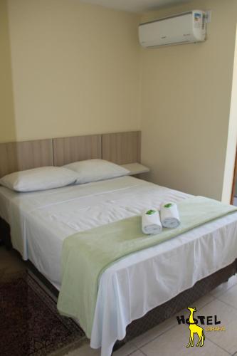Кровать или кровати в номере Hotel Girafa