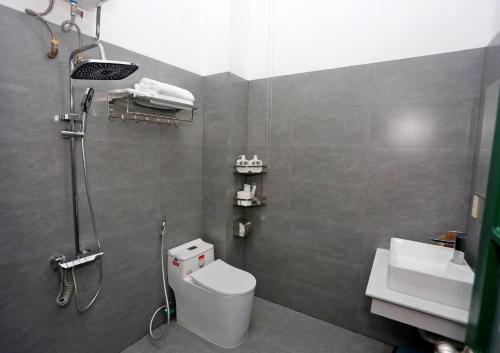 Ένα μπάνιο στο Plumeria Homestay