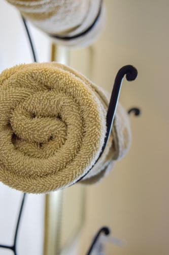 a coil of rope in a pot on a wall at Finca Selah in Ensenada