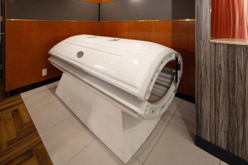 a white toilet in a bathroom with at ホテル ブルジュア 久留米 Hotel Bvljua -レジャーホテル- in Kurume