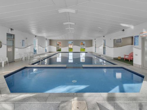 a large swimming pool in a building at BIG4 Ingenia Holidays Queenscliff Beacon in Queenscliff