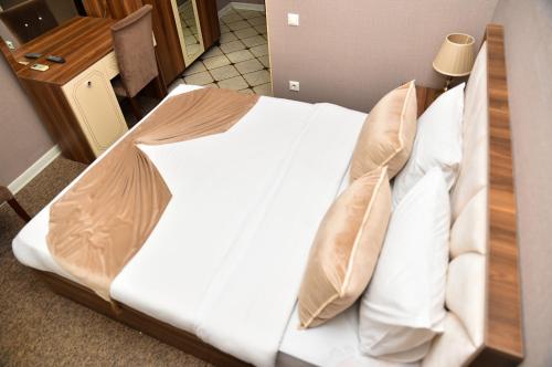Кровать или кровати в номере Boulevard Rigs Boutique Hotel