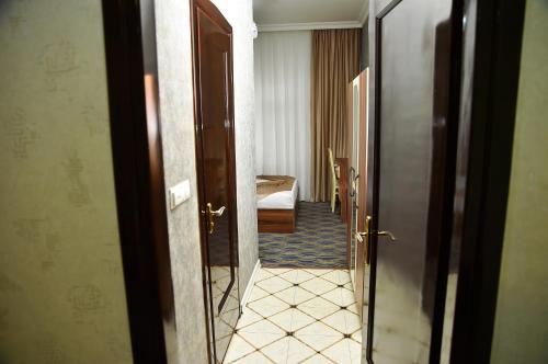 Кровать или кровати в номере Boulevard Rigs Boutique Hotel