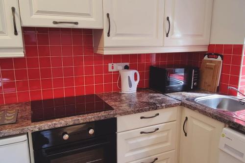 Una cocina o cocineta en Sweethaven Chalet