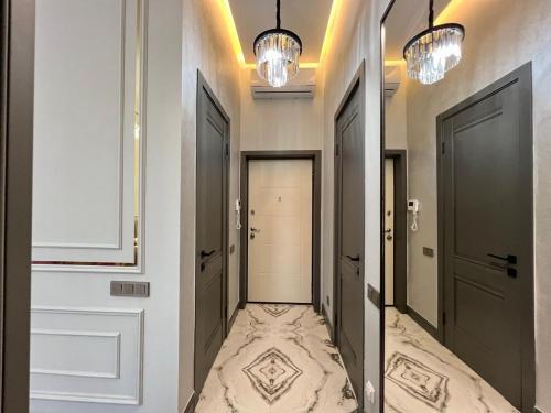 Ένα μπάνιο στο Стильные апартаменты в элитном комплексе