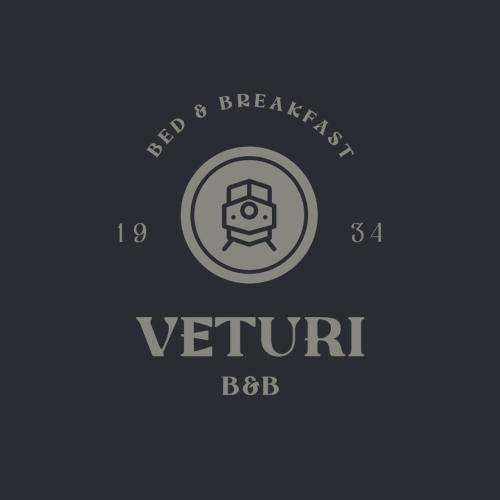 a logo for a v return bbb at Lentävä Kalakukko -Veturi B&B in Kuopio