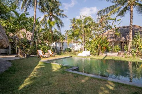 Bazén v ubytování Tiki Boutique Hotel Spa Lombok nebo v jeho okolí