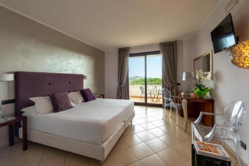 Postel nebo postele na pokoji v ubytování Grand Hotel Sofia