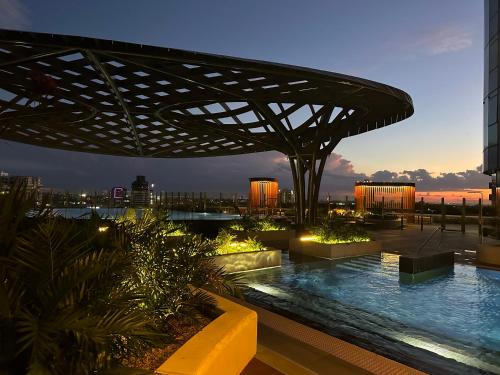 a view of a pool on top of a building at Skyline Serenity Retreat in Melbourne