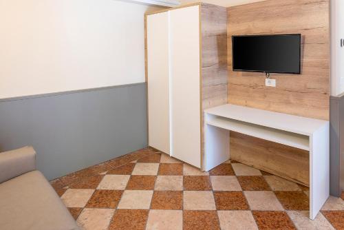 Residenza Panoramaにあるテレビまたはエンターテインメントセンター