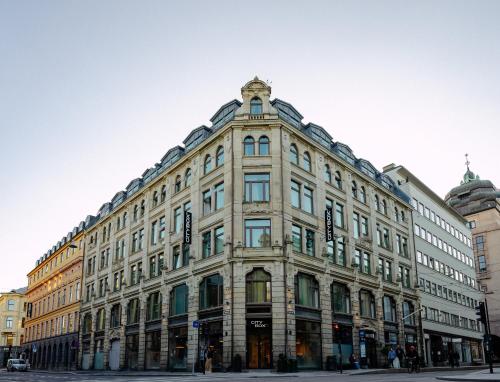 a large building on the corner of a street at Citybox Oslo in Oslo