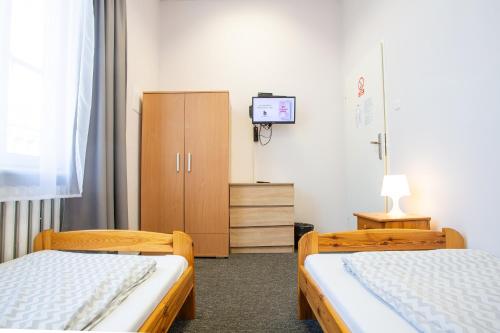 Moon Hostel Wrocławにあるベッド
