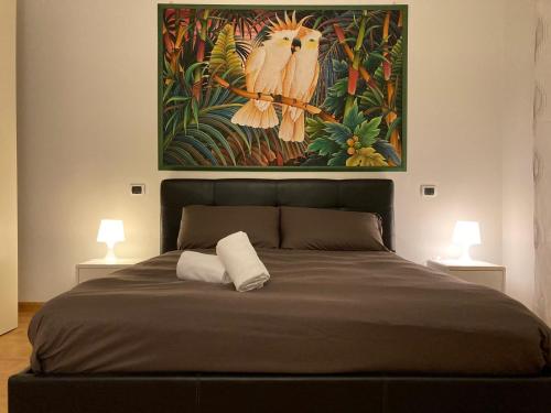 Postel nebo postele na pokoji v ubytování Giovigemini Apartment