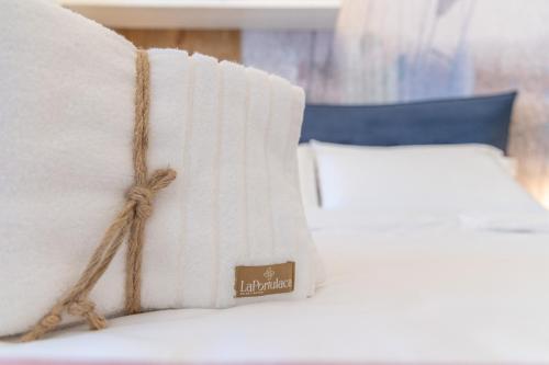 Ένα ή περισσότερα κρεβάτια σε δωμάτιο στο LaPortulaca Relax & Nature
