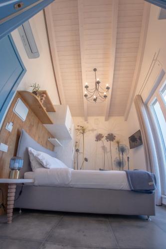 Ένα ή περισσότερα κρεβάτια σε δωμάτιο στο LaPortulaca Relax & Nature