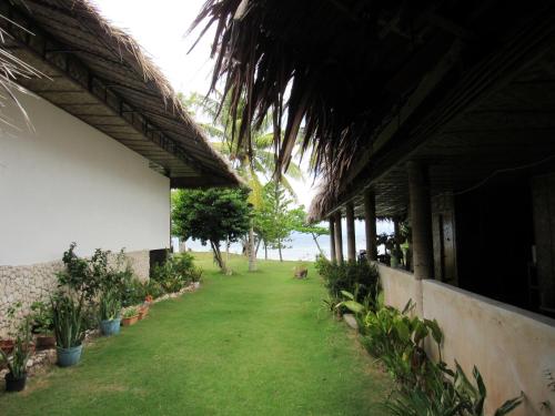 Zahrada ubytování DACOZY Beach Resort