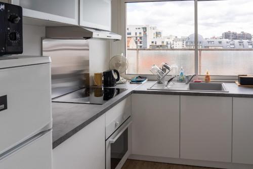 Kuchyň nebo kuchyňský kout v ubytování F2 HyperCentre Clermont Ferrand