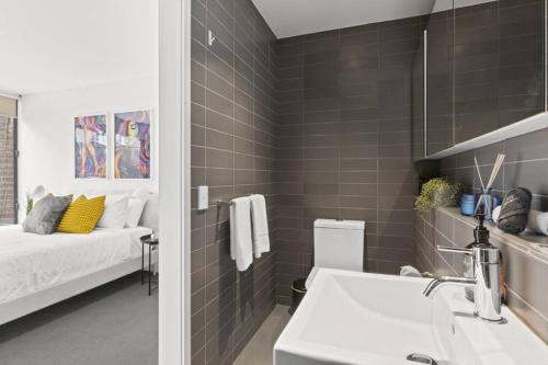 Кровать или кровати в номере Ink Echelon Escape