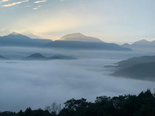 a view of a lake with mountains in the background at 日月對白 日月潭 2024全新開幕 in Yuchi